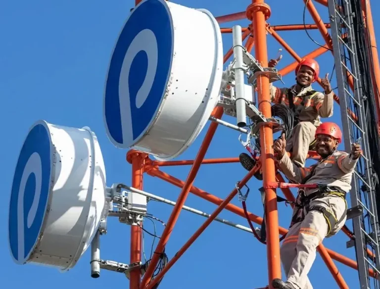 Paratus Team members maintaining communications hardware.